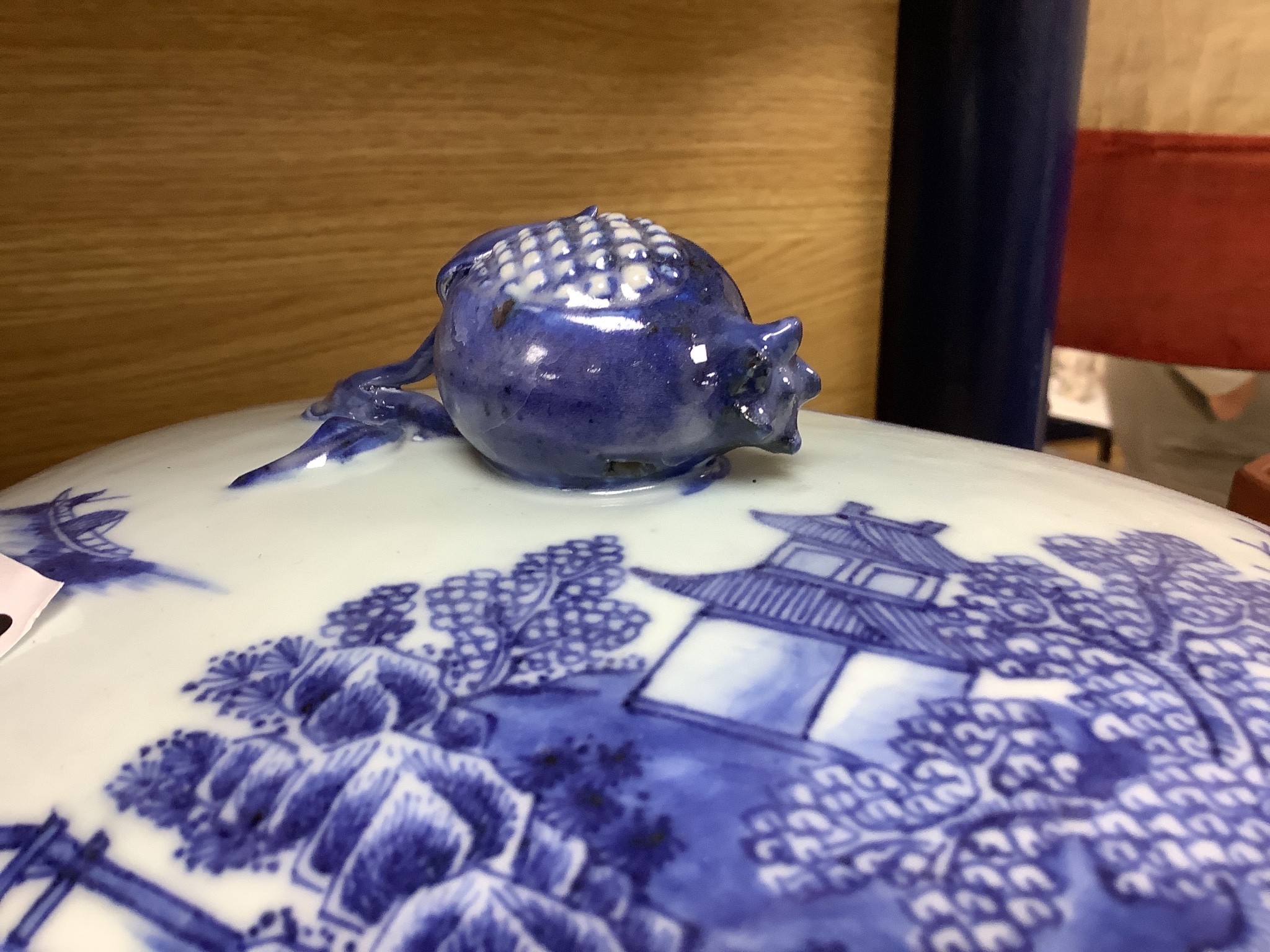 A 18th century Chinese export blue and white tureen and cover pomegranate finial, length 35cm